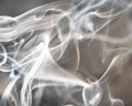 Copper brown abstract background - Trail of smoke on a dark background - creative colour effects with smoke smudges Royalty Free Stock Photo