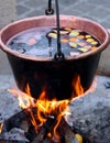 Copper cauldron with the tasty mulled wine