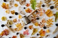 Copper cezve coffee among autumn leaves and cones, layout, top view