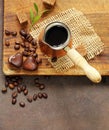 Copper cezve coffee and grains Royalty Free Stock Photo