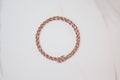 Copper chain close-up mock up for blogger. Fashion chain on a white background in a round frame for design