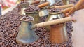 Copper coffee pots and granular coffee Royalty Free Stock Photo