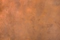 Copper-coloured enamel painted surface. Abstract background