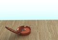 Copper compass isolated on wooden table