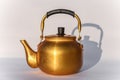 Copper desert tea pot, antique metal teapot isolated on white background, antique kettle, golden teapot, metal teapot, Chinese tea Royalty Free Stock Photo