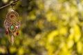 Copper dreamcatcher with amethyst and nephritis stones background