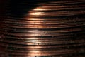 Copper coil with contactor in macro, copper background