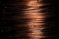 Copper coil with contactor in macro, copper background