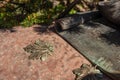 Copper forged maple leaf on granite stone