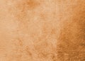 Copper gold velvet background or orange golden velour flannel texture made of cotton or wool with soft fluffy velvety satin fabric Royalty Free Stock Photo