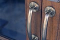 Copper handle on antique door, design doorway with glass