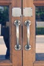 Copper handle on antique door, design doorway with glass