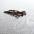 Copper Head Pins for Jewelry Making Flat Head Pins Jewelry Findings. DIY Handmade Craft Concept Royalty Free Stock Photo