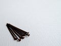 Copper Head Pins for Jewelry Making on White Background Baner. Jewelry Findings. Handmade Craft Concept Royalty Free Stock Photo