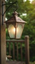 Copper Lantern Hanging on Wooden Post at Dusk Royalty Free Stock Photo