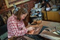 Copper master, hands detail of craftsman at work Royalty Free Stock Photo