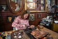 Copper master, hands detail of craftsman at work Royalty Free Stock Photo