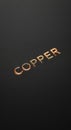 Copper metal lettering on black background Royalty Free Stock Photo