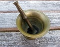 Copper mortar, pestle and black lava salt