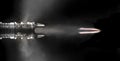 Bullet flying from a flash hider on an AR-15 Royalty Free Stock Photo