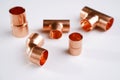 Copper plumbing fitting adapter copper pipe accessories  at white Royalty Free Stock Photo