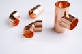 Copper plumbing fitting adapter copper pipe accessories  at white Royalty Free Stock Photo