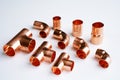 Copper plumbing fitting adapter copper pipe accessories  at white Royalty Free Stock Photo