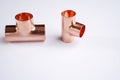 Copper plumbing fitting adapters copper pipe accessories isolated at white Royalty Free Stock Photo