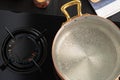 Copper pot with boiling water on a gas stove Royalty Free Stock Photo