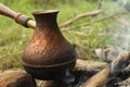 A copper pot with coffee Royalty Free Stock Photo