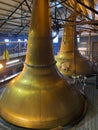Copper pot stills - Dalwhinnie Whisky Distillery Royalty Free Stock Photo