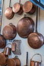 Copper Pots and Pans and other Kitchen Utensils in an Antique Kitchen Royalty Free Stock Photo