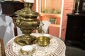 Copper samovar on round table Royalty Free Stock Photo