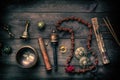 Copper singing bowl, prayer beads, prayer drum and other Tibetan religious objects for meditation