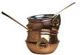 copper and stainless serving dishes (indian handi, karahi pots, spoon, bowl with handles) stacked