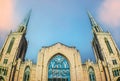 Copper steeples and stained glass windows of gothic church with wide angle-fisheye leands  Room for copy and perspective Royalty Free Stock Photo