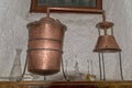 Copper still alembic inside distillery