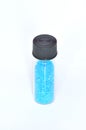 Copper sulfate crystals in a glass container