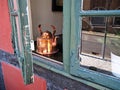 Copper tea pot kettle in a window of an old house Royalty Free Stock Photo