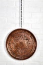 Copper tray hanged on wall Royalty Free Stock Photo