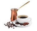 Copper turkish coffee pot, beans and cup of hot drink on white background Royalty Free Stock Photo