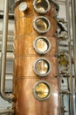 Distillate production process in copper distillation unit. Cpper vacuum still for distillation performed under reduced pressure Royalty Free Stock Photo