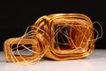 Copper windings different sizes from electric current transformers Royalty Free Stock Photo