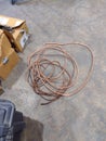 Piles of Stripped Copper Wire Inside Industrial Warehouse