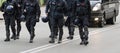 Cops while marching together in the middle of the road Royalty Free Stock Photo