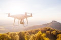 copter drone flying at sunset Royalty Free Stock Photo