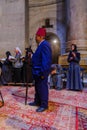 Coptic priests and pilgrims pray, Good Friday, Holy Sepulchre church