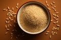 Copy friendly backdrop featuring a flat lay of sesame seeds in a bowl