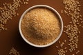 Copy friendly backdrop featuring a flat lay of sesame seeds in a bowl