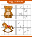 Copy the picture, copy the picture of Teddy Bear and Rocking Horse using grid lines. Educational children game, printable Royalty Free Stock Photo
